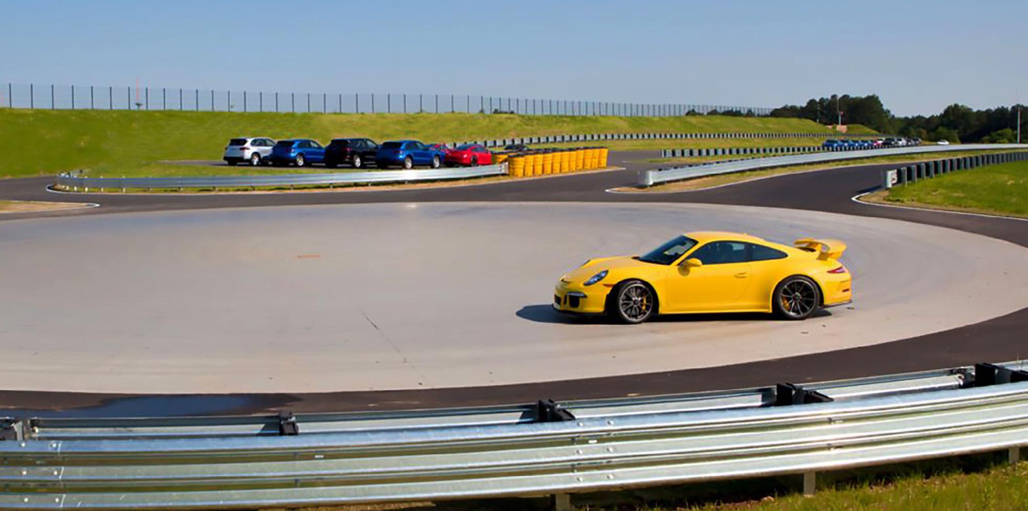 Yellow Porsche 911 Turbo SS at Porsche experience center